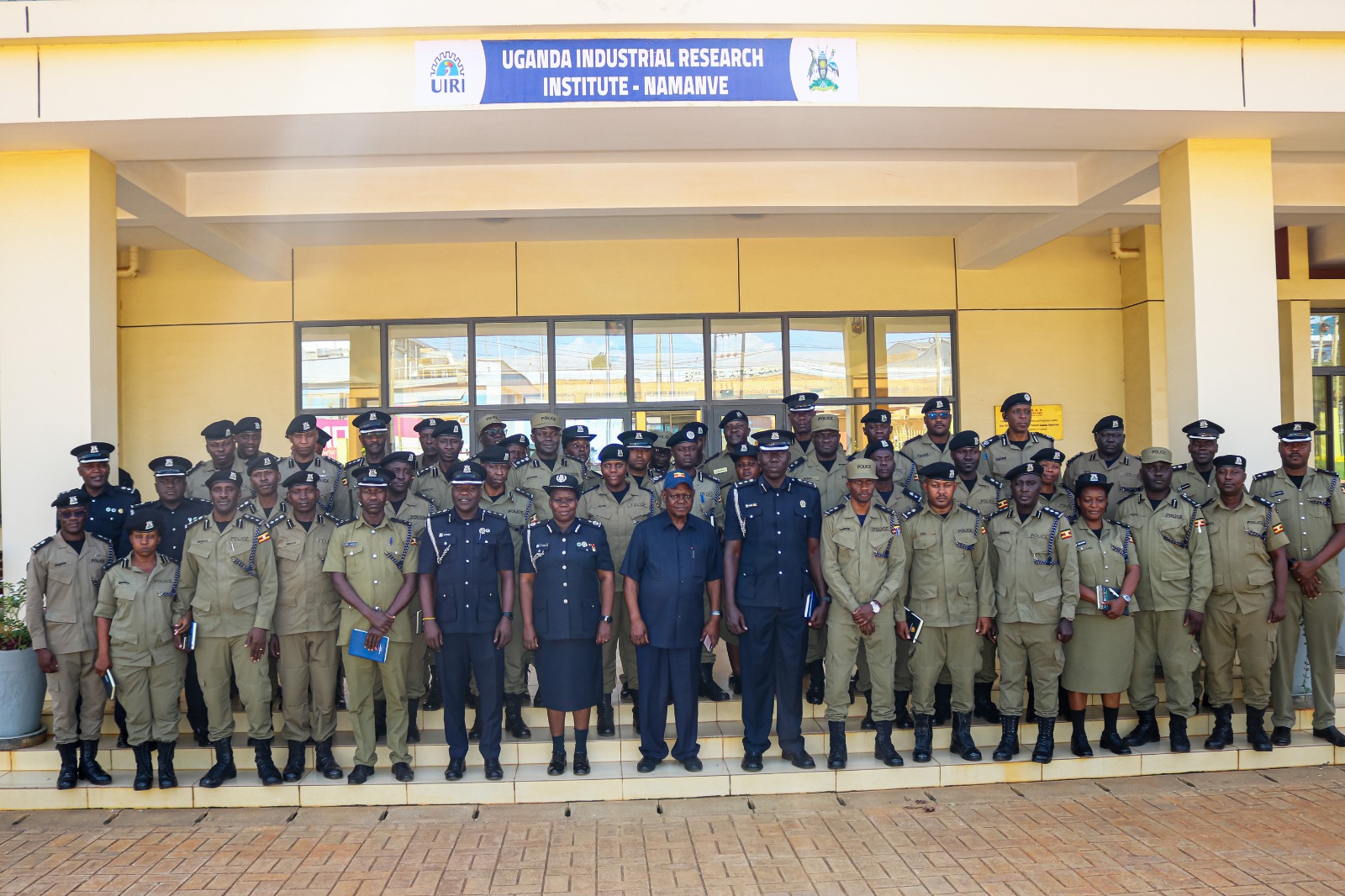 Officers from the Police Command and Staff College Bwebajja with UIRI hosts outside UIRI Namanve